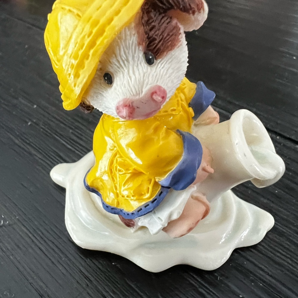 Mary’s Moo Moos “When It Rains It Pours” Ceramic Cow in Yellow Raincoat